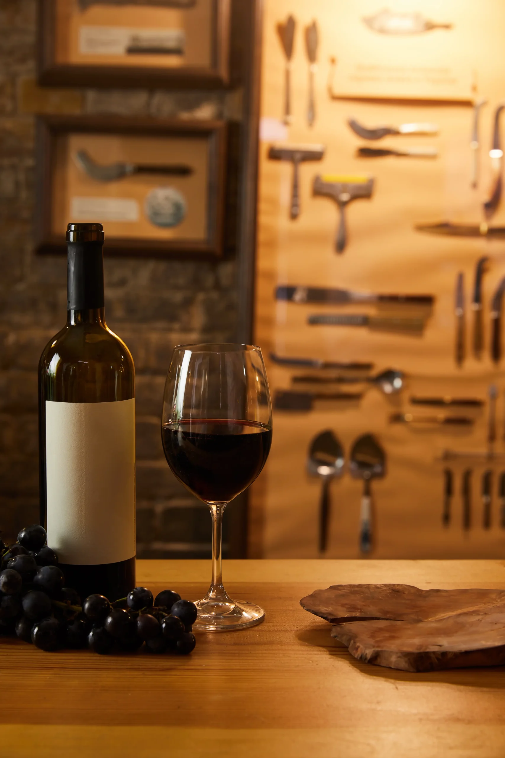 close-up-shot-of-bottle-of-red-wine-with-glass-and-2024-11-18-19-51-23-utc